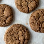 baked gingerdoodles on a cookie sheet.