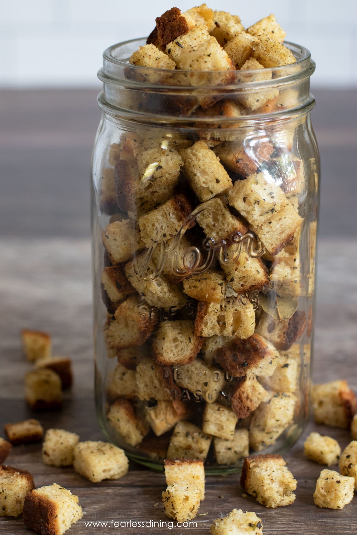 A mason jar filled with gluten free stuffing mix.