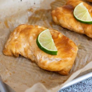 Baked glazed cod in a baking dish.