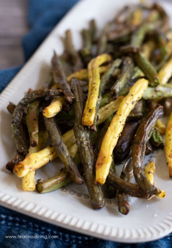 A platter of roasted air fried green beans.
