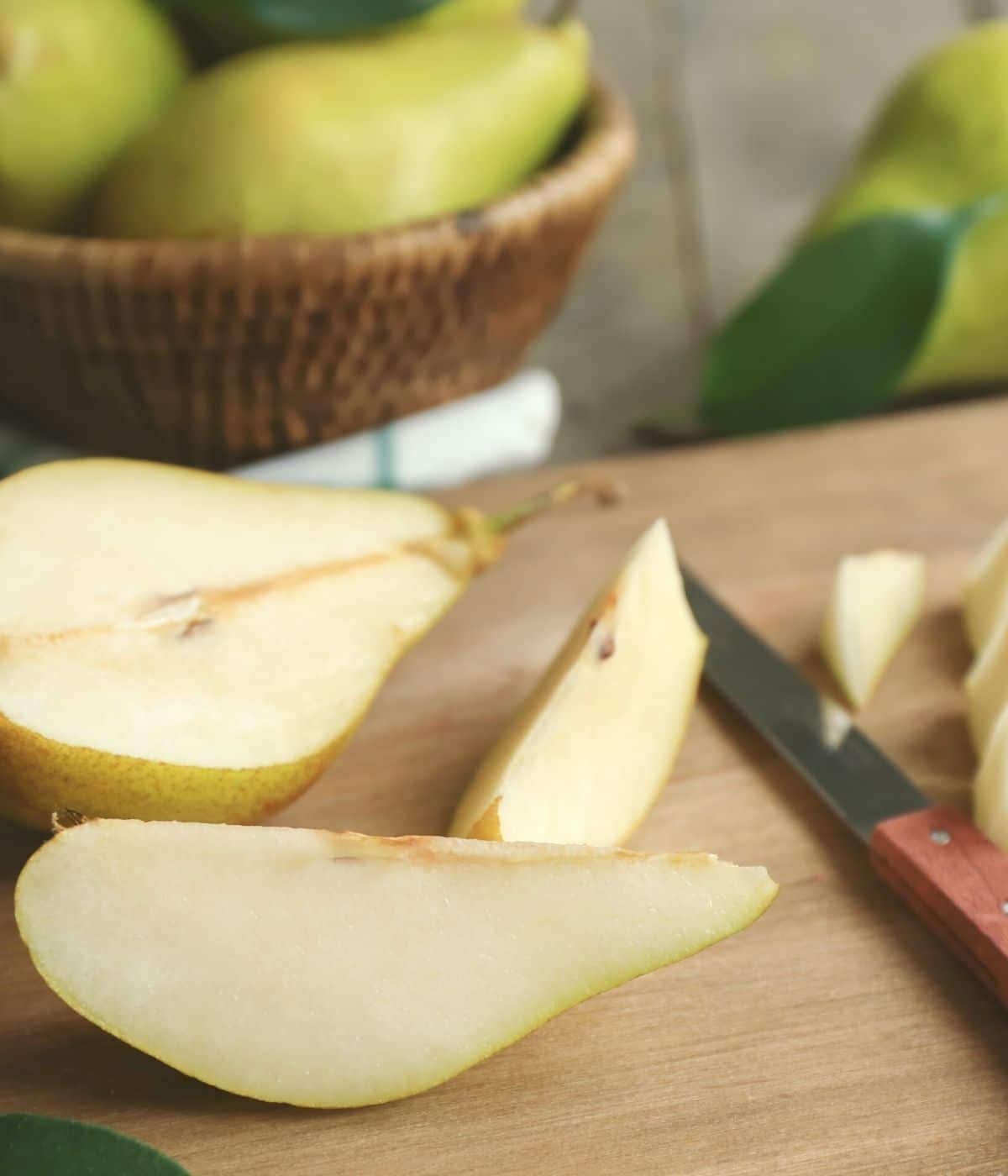cutting pears on a cutting board