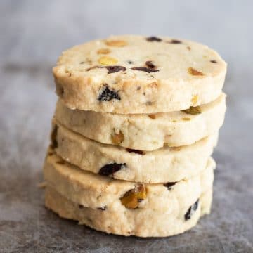 A stack of four gluten free cranberry shortbread cookies