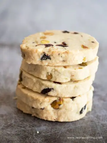 A stack of four gluten free cranberry shortbread cookies