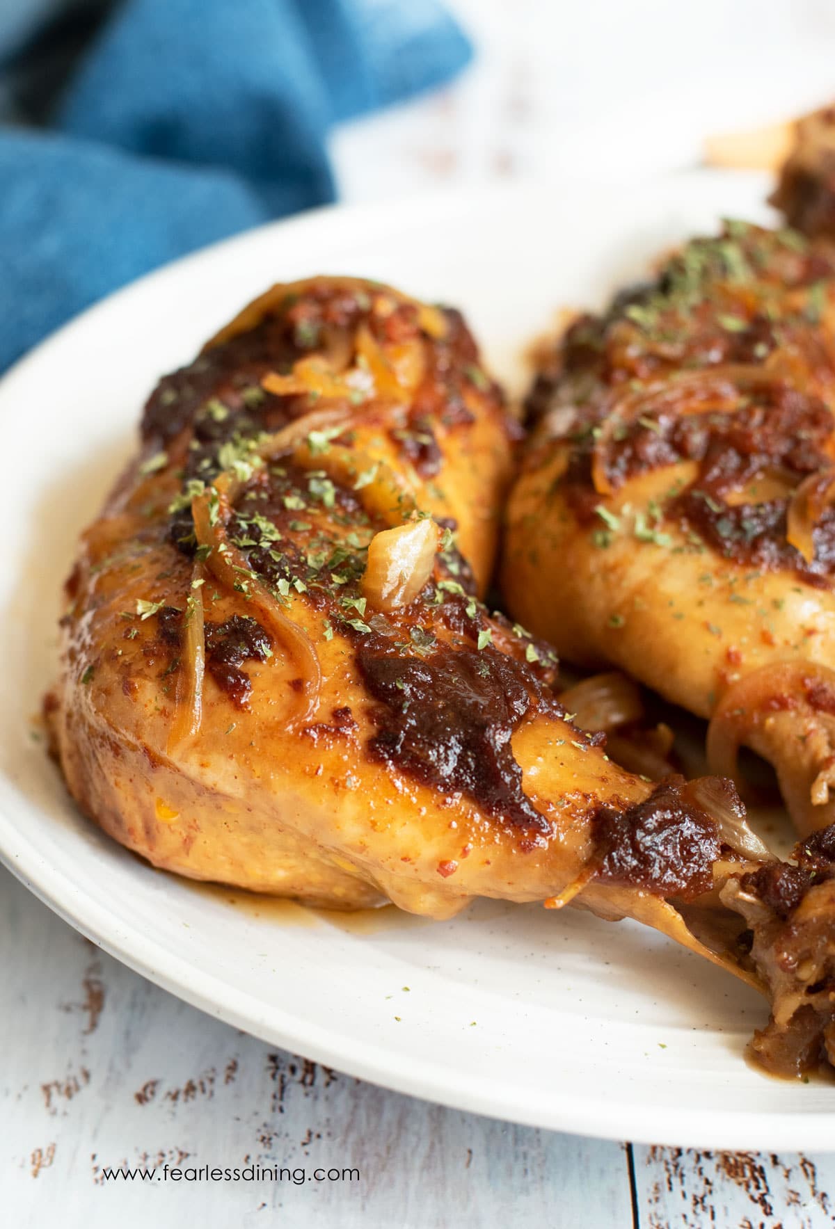 Slow cooker leg quarters on a platter.