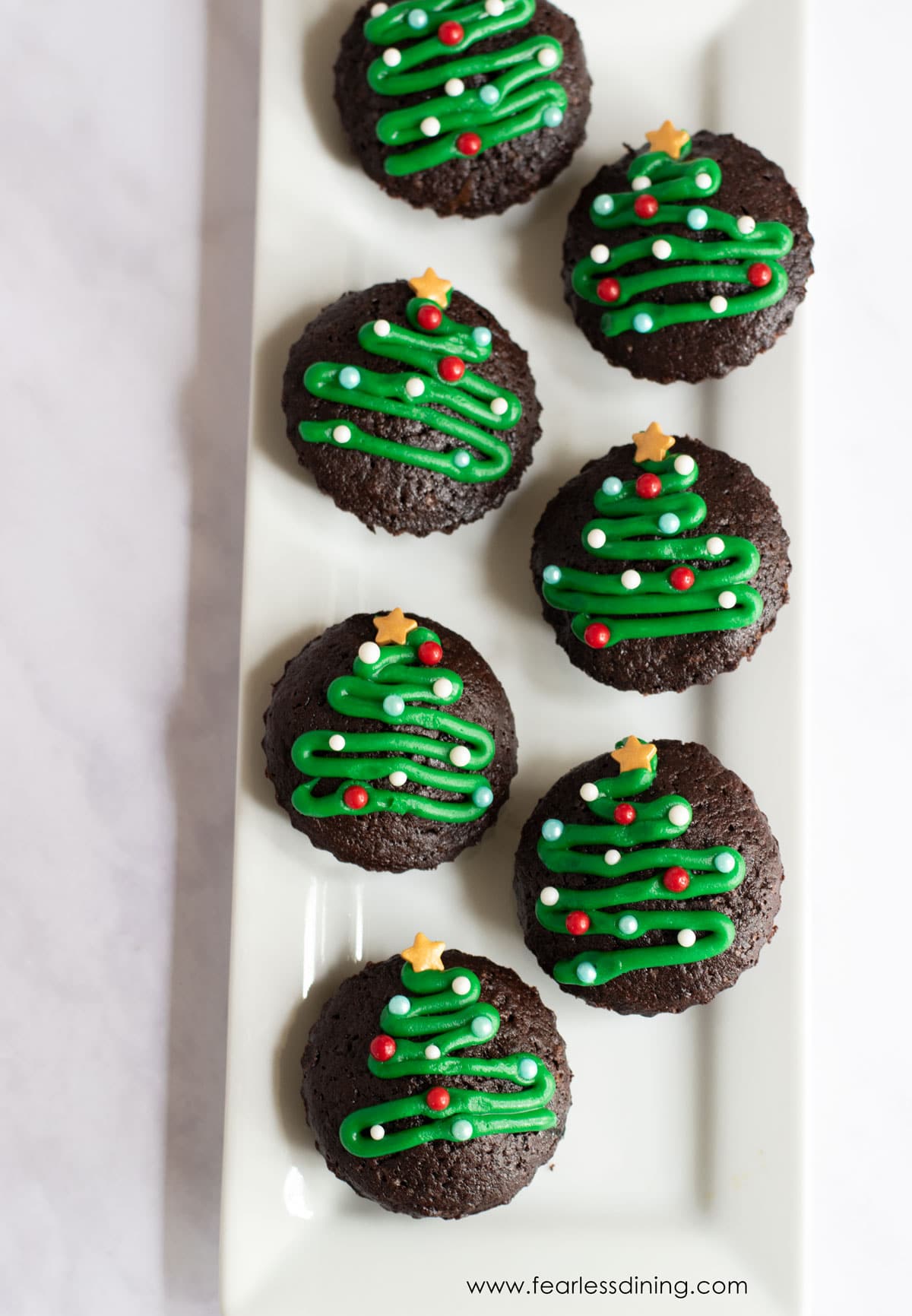 Christmas brownie bites on a tray.