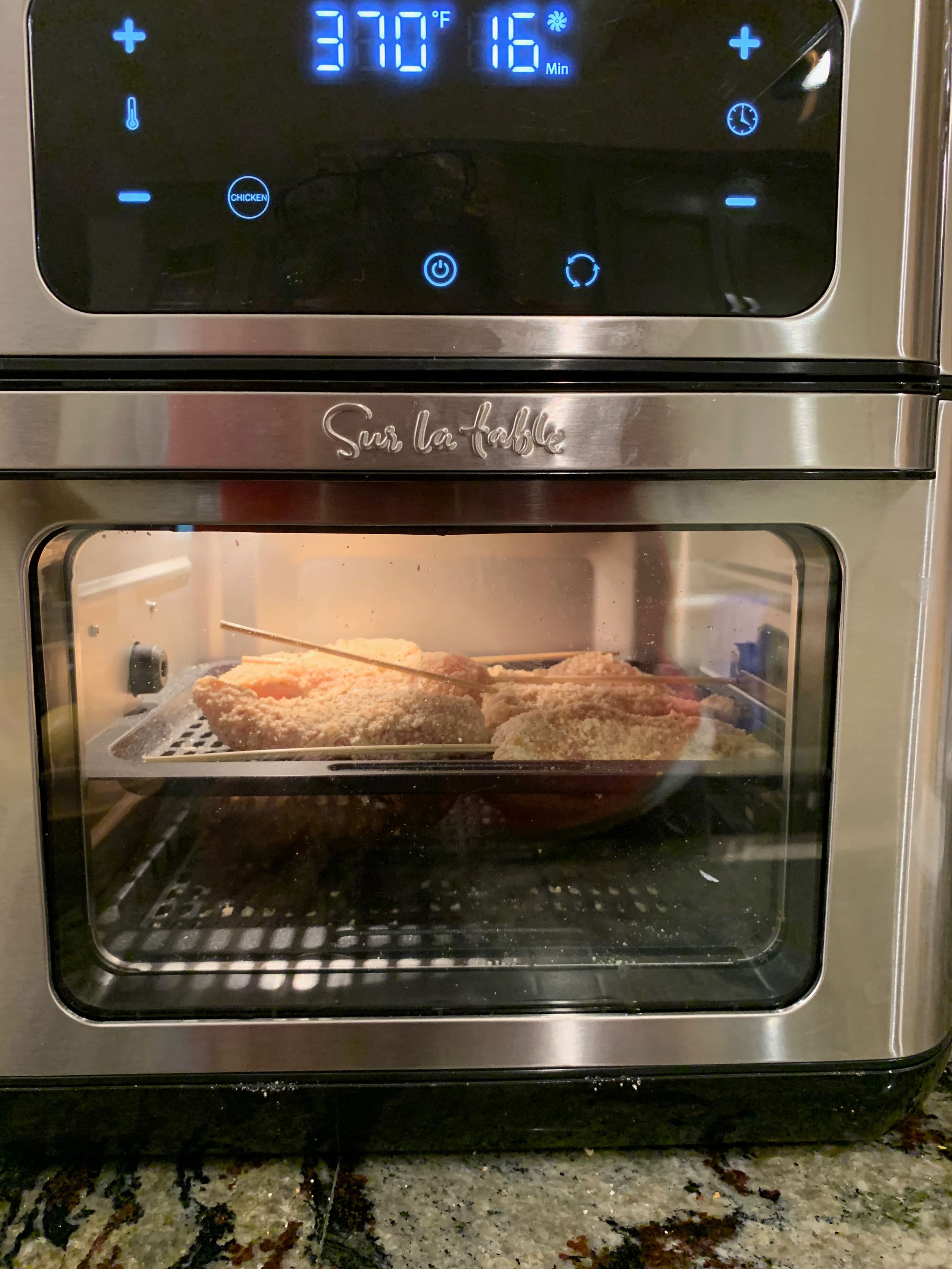 Chicken tenders cooking in the air fryer.