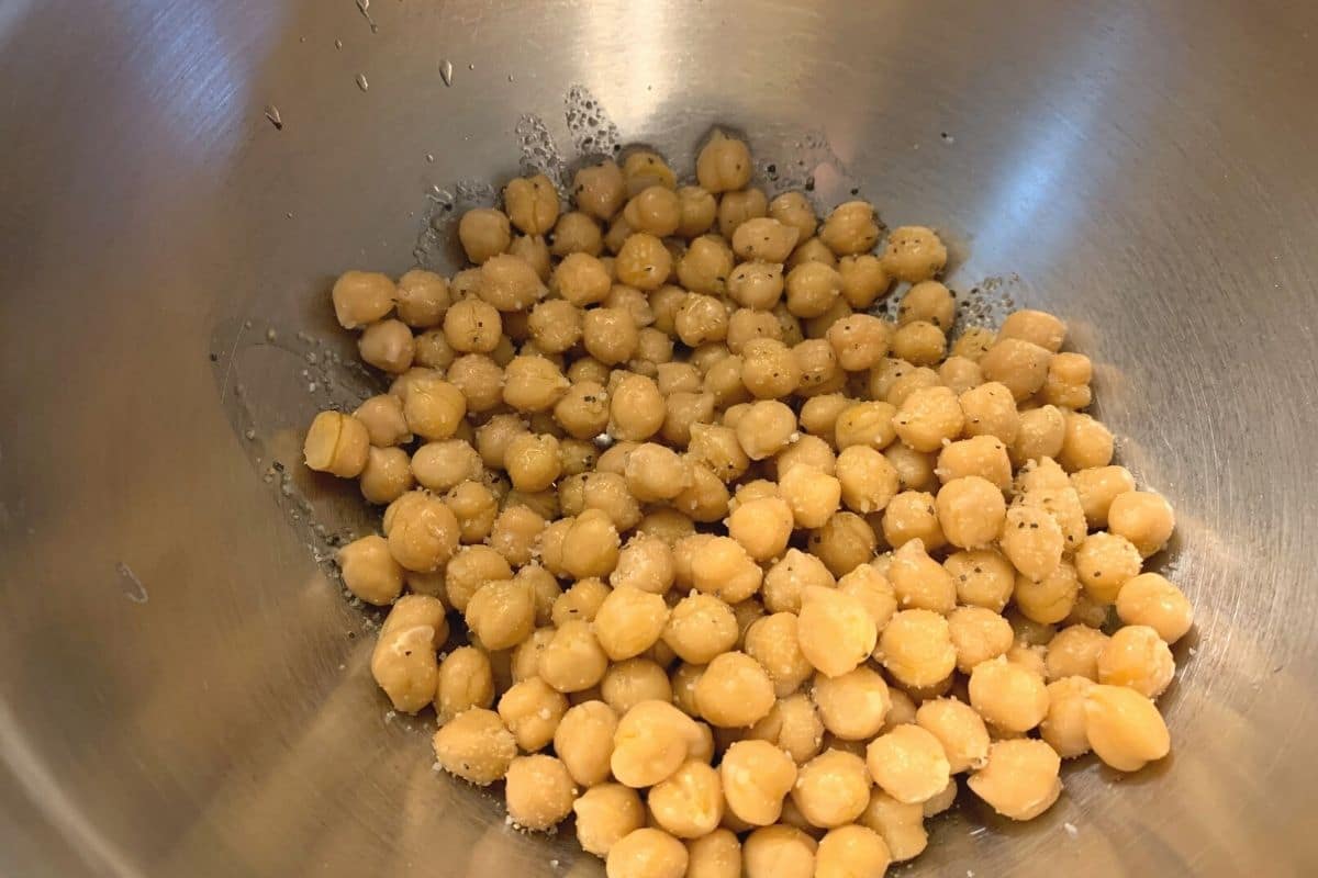 The chickpeas in a large silver bowl.