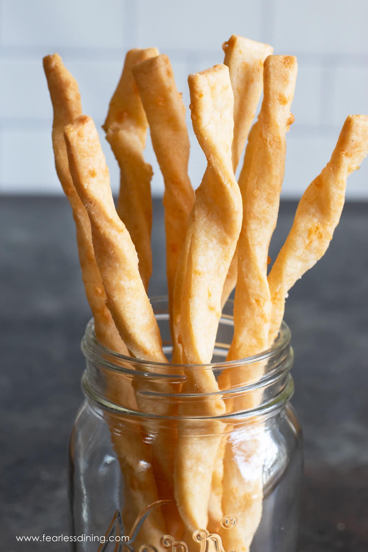 A close up view of the cheese straws.