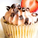 A Pinterest pin image of a strawberry cupcake.