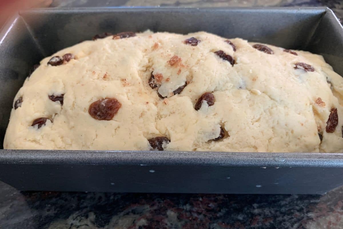 The cinnamon raisin dough in the loaf pan.