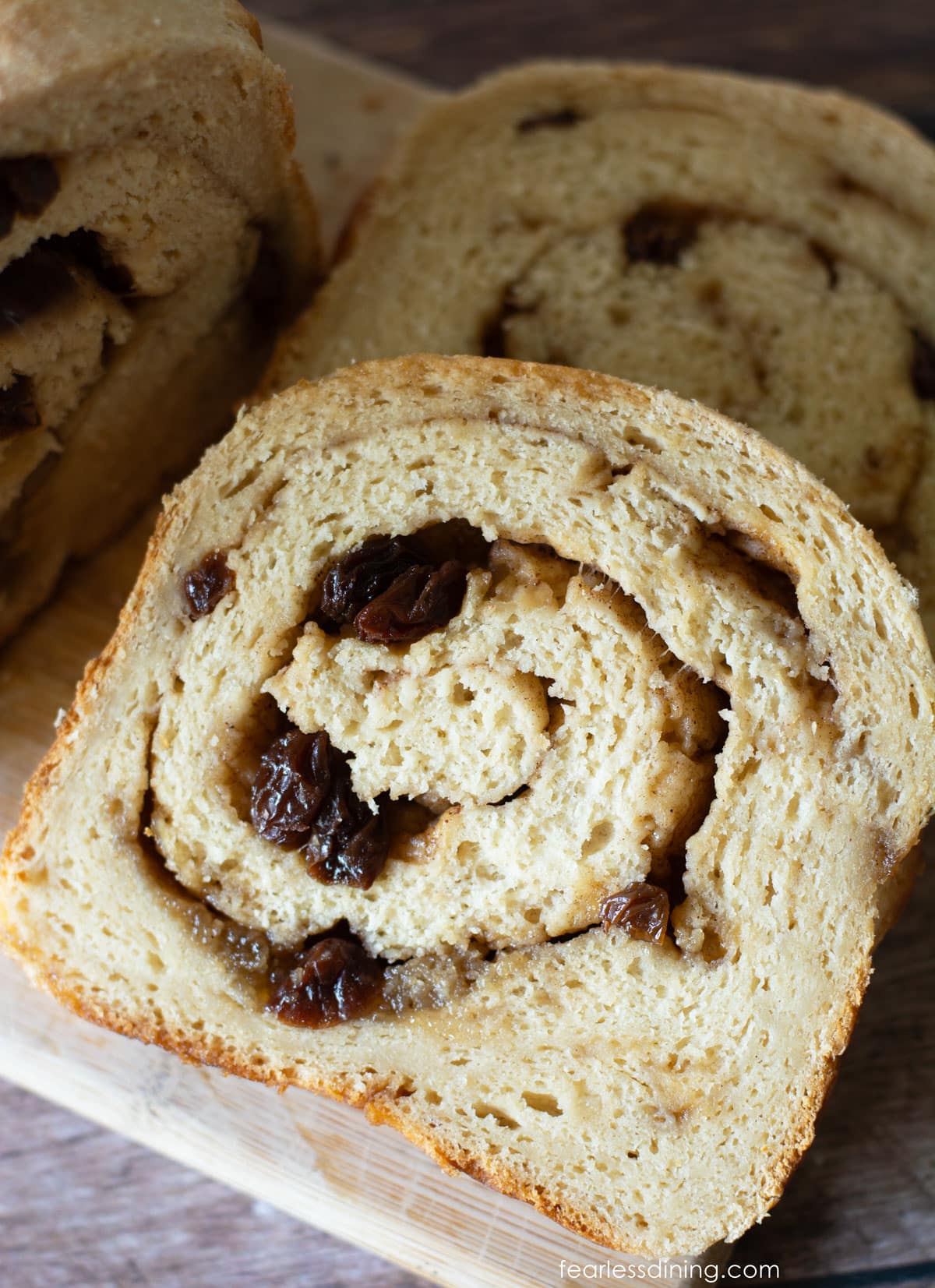 A slice of homemade gluten-free cinnamon raisin bread.