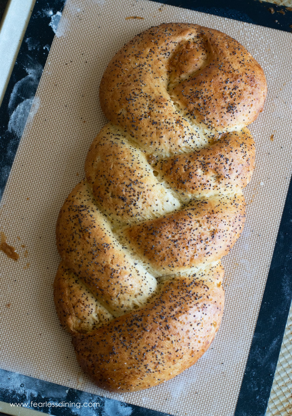 A whole gluten free challah that came out of the oven.