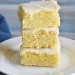 A stack of three gluten free lemon brownies.