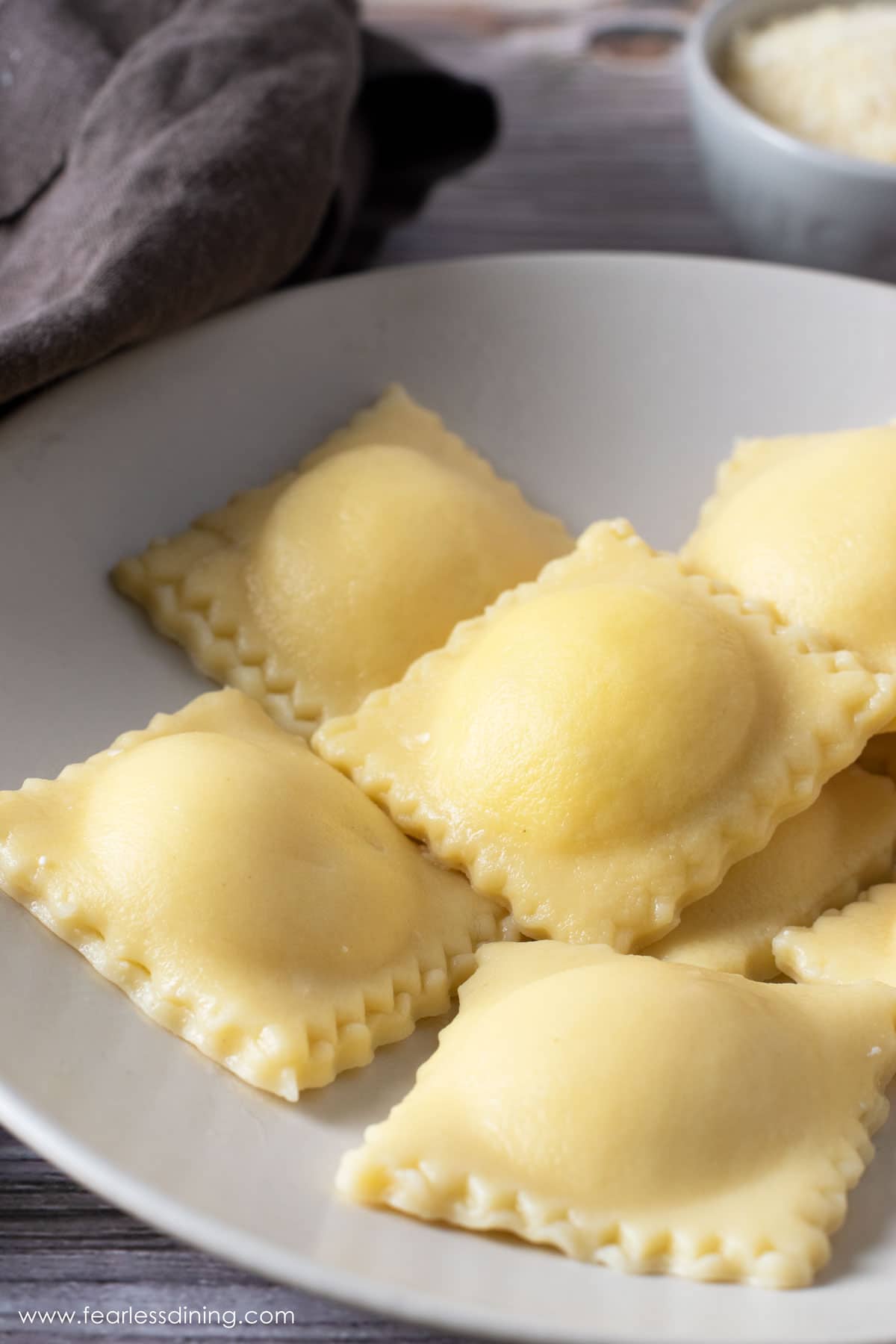 A bowl of cooked gluten free ravioli without sauce.