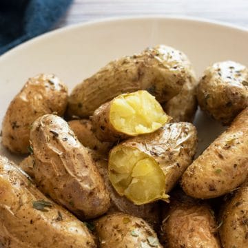 A bowl full of roasted air fryer fingerlings potatoes.