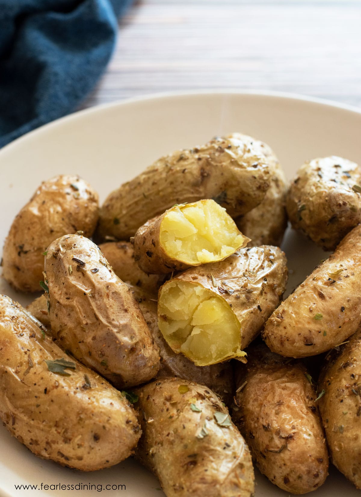 A bowl full of roasted air fryer fingerlings potatoes.