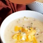 A Pinterest image of a bowl of the potato chicken soup.