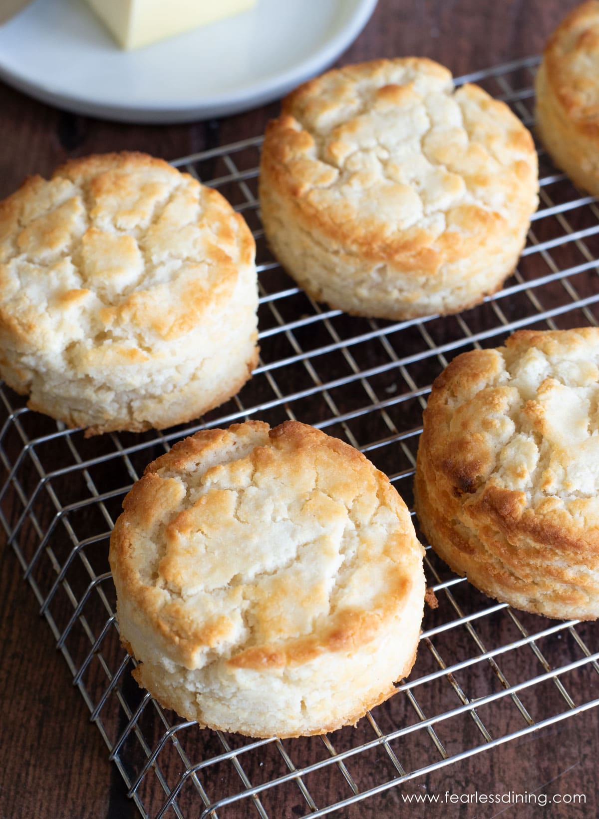 GF Bisquick biscuits cooling on a wire rack.