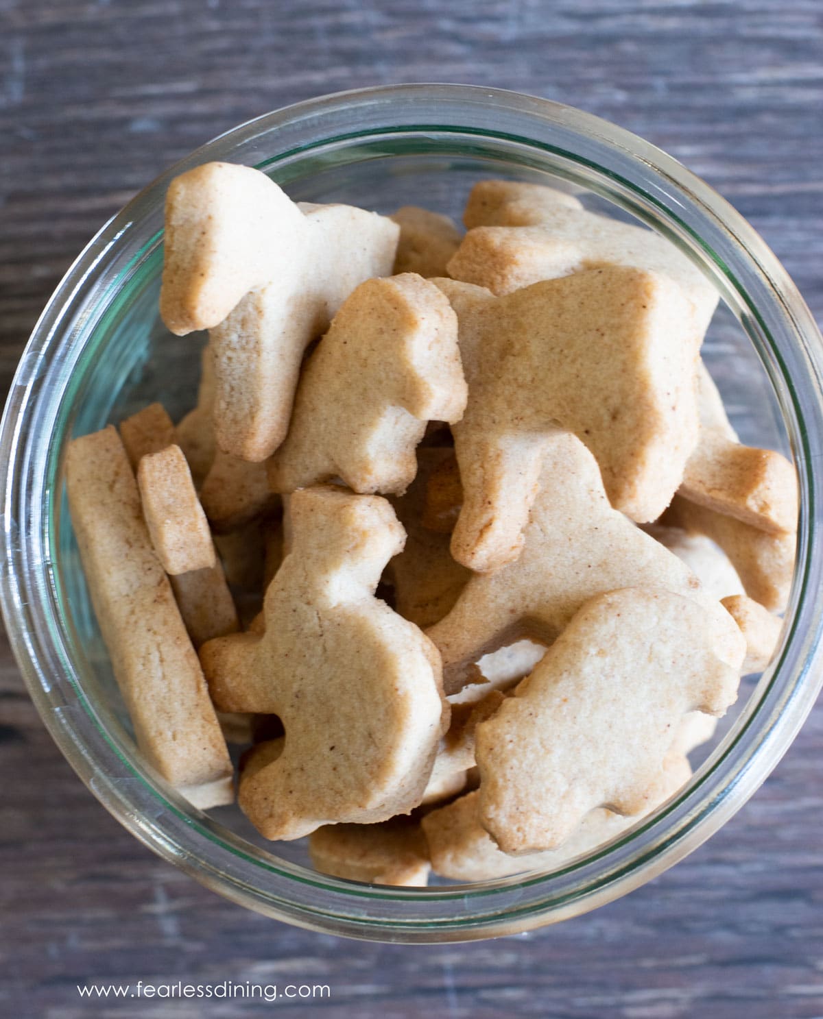 A jar of gluten free animal cookies.