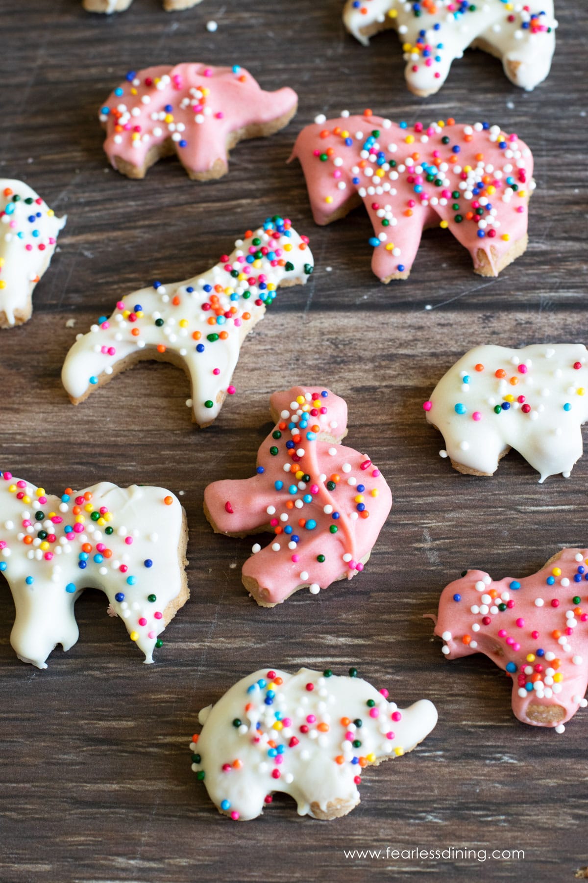 The gluten free circus cookies on a board.