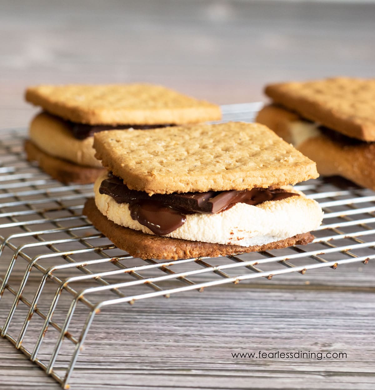 Assembled air fryer s'mores on a rack.