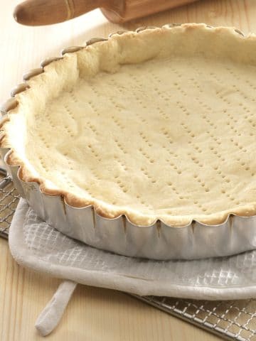 a baked pie crust in a pan