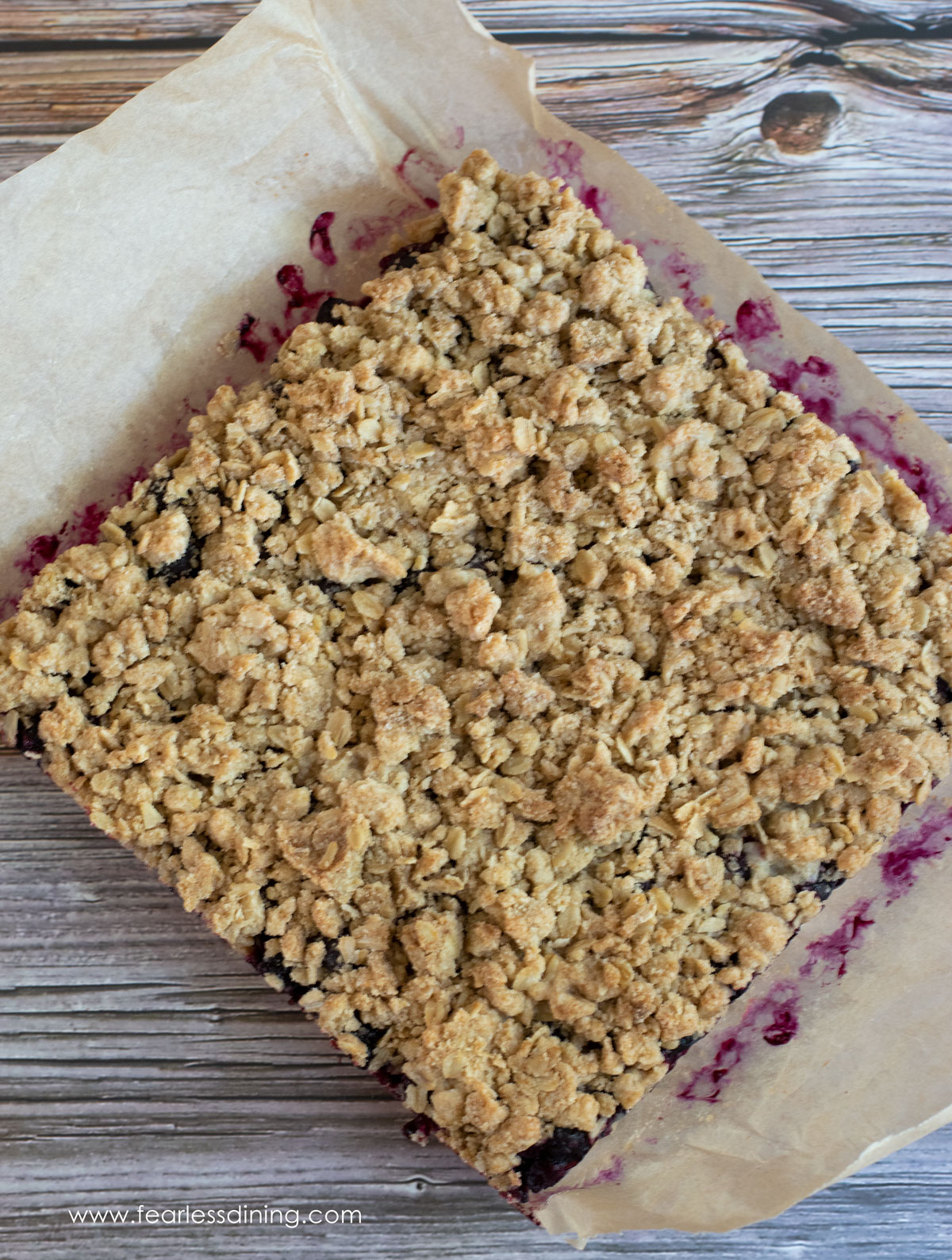 The top view of the baked blueberry crumb bars.