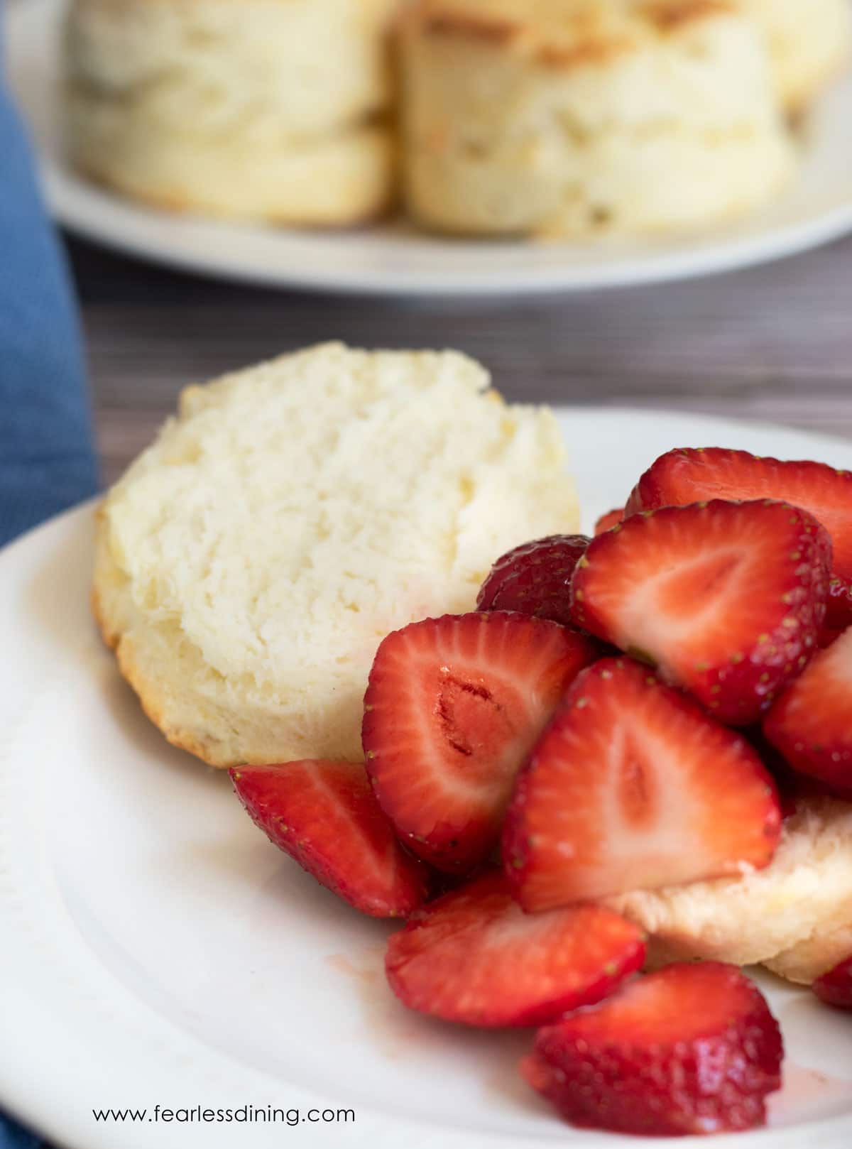 The strawberries on the cut biscuit.