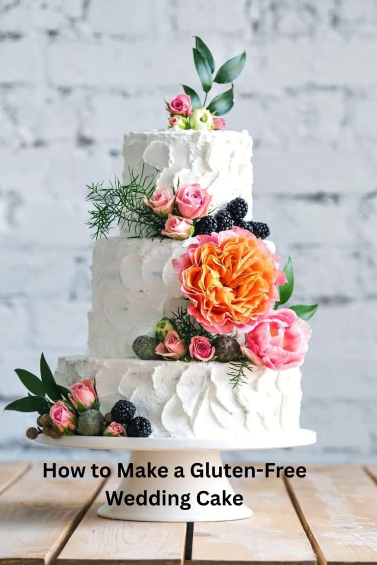 A gluten-free wedding cake decorated with flowers.