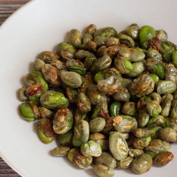 A bowl of roasted fava beans.