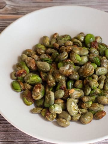 A bowl of roasted fava beans.