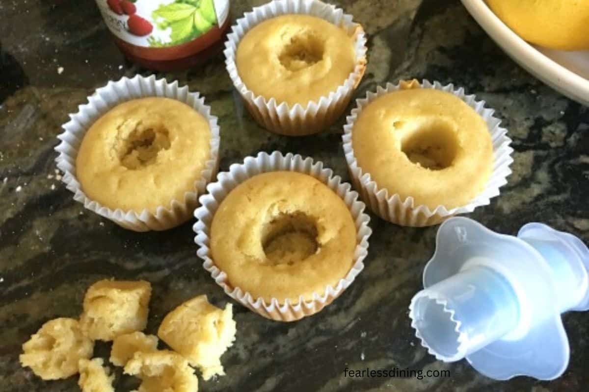 A tool scooping out the cupcake middles.