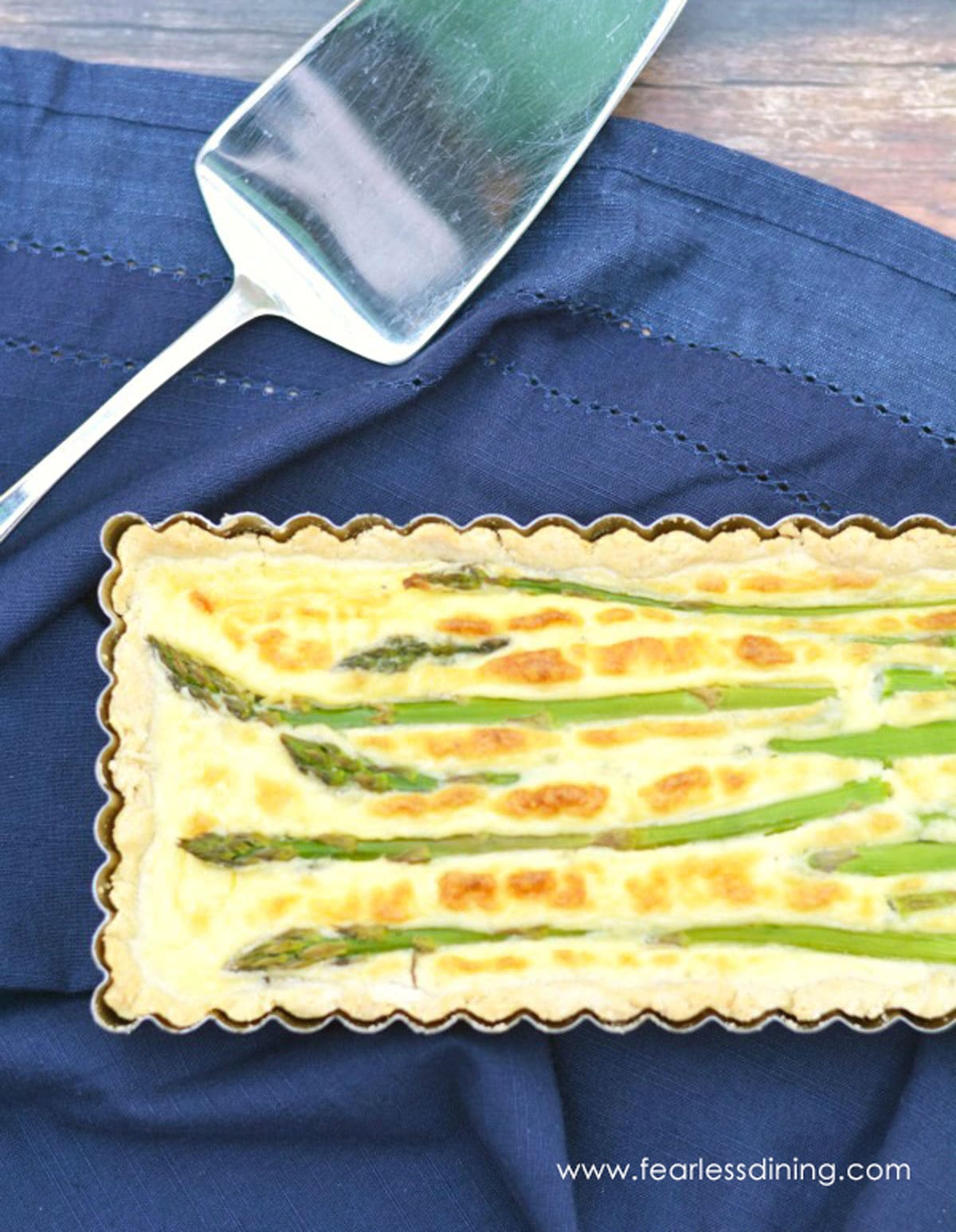 A close up of the asparagus tart in the pan.