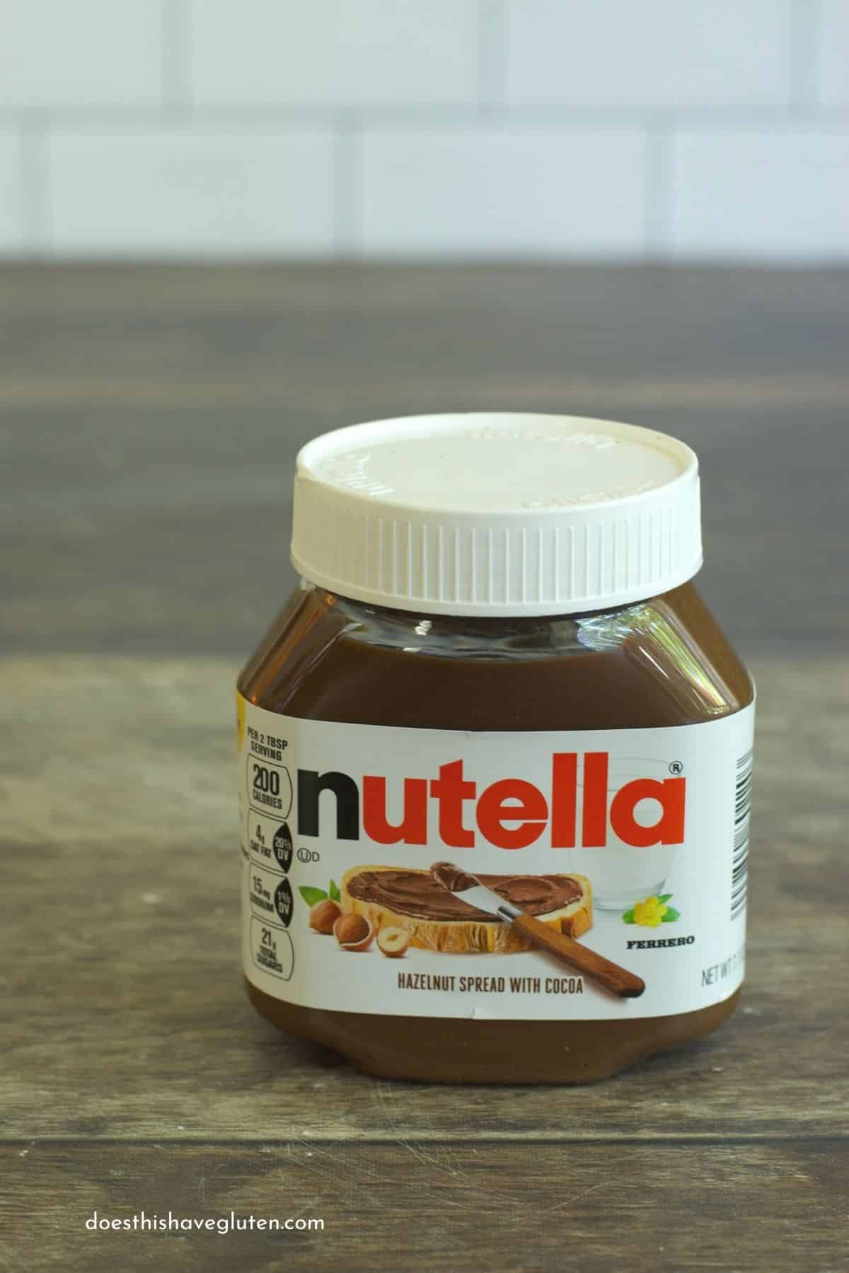 A small jar of nutella on the counter.