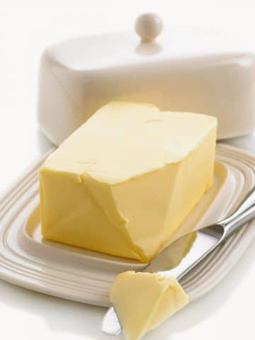a butter dish with butter.