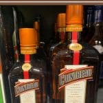 pin image of cointreau bottles.