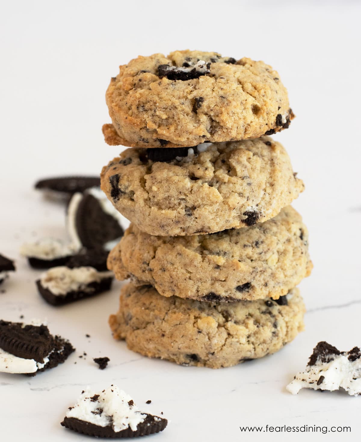 A stack of four cookies and cream cookies.