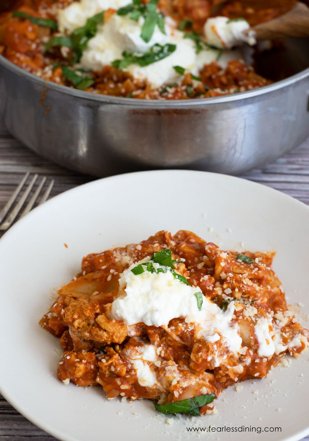 A serving of skillet lasagna on a plate.