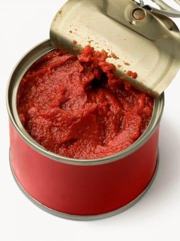 an open can of tomato paste.