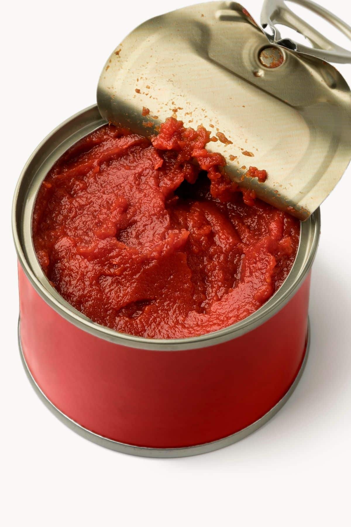 an open can of tomato paste.