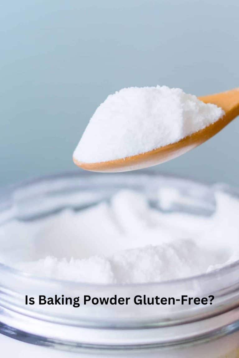 A photo of a measuring spoon with baking powder in it.