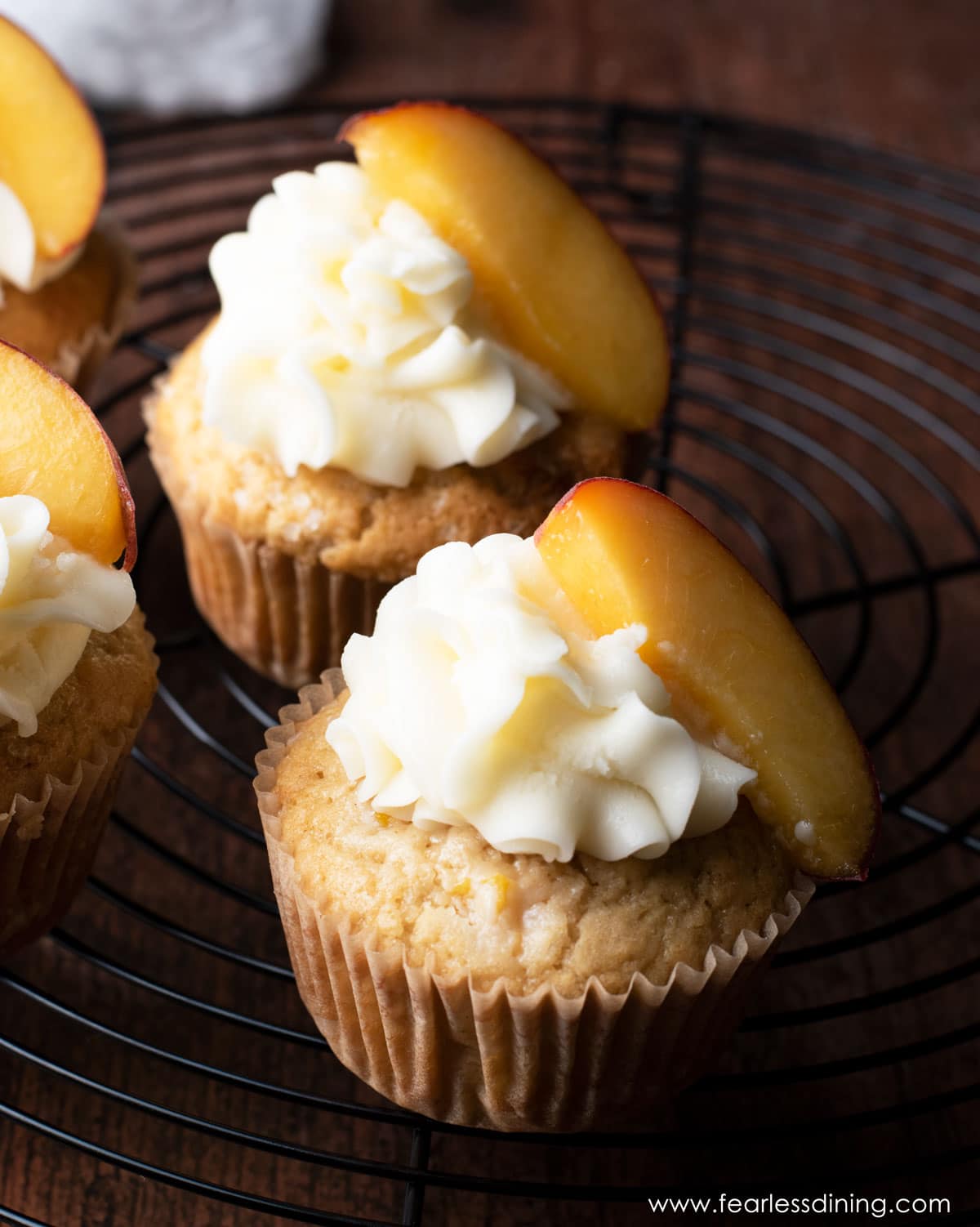 a close up of the peaches and cream cupcakes.