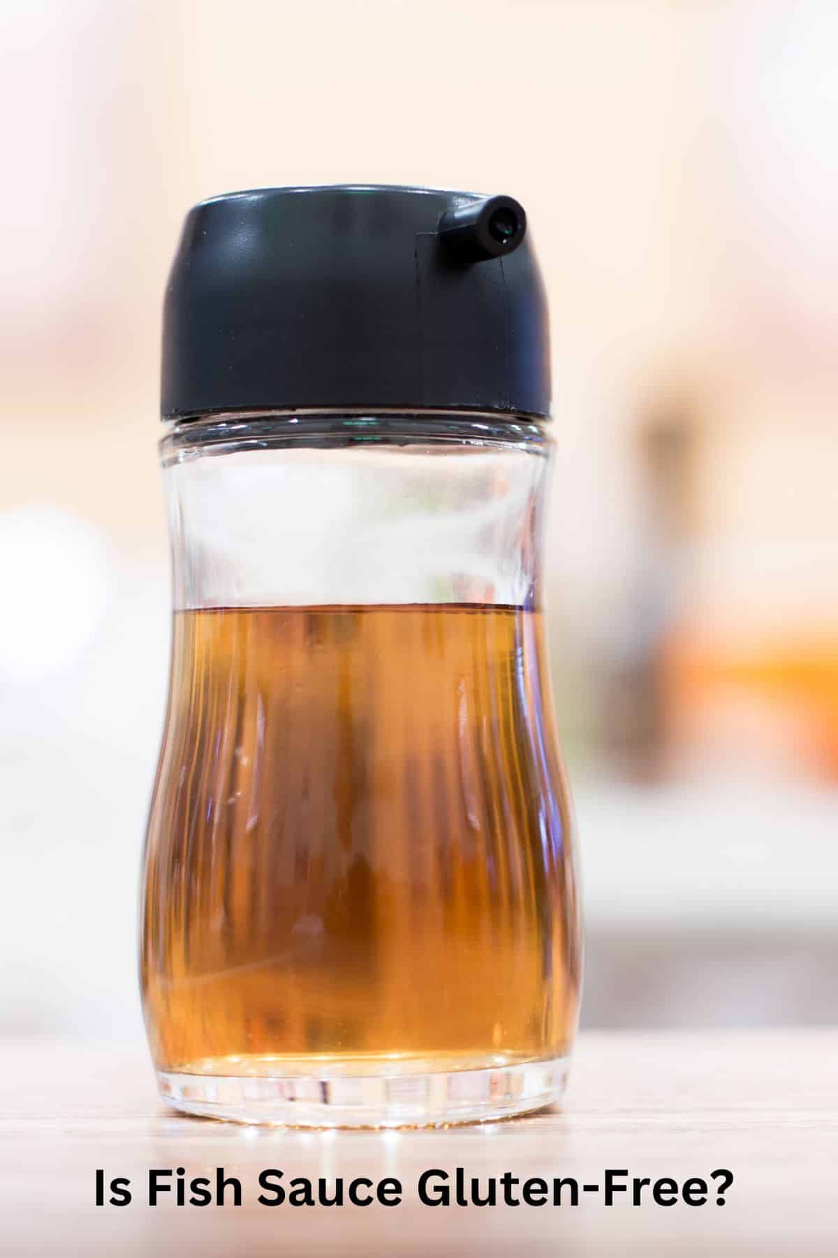 A jar of fish sauce on a counter.