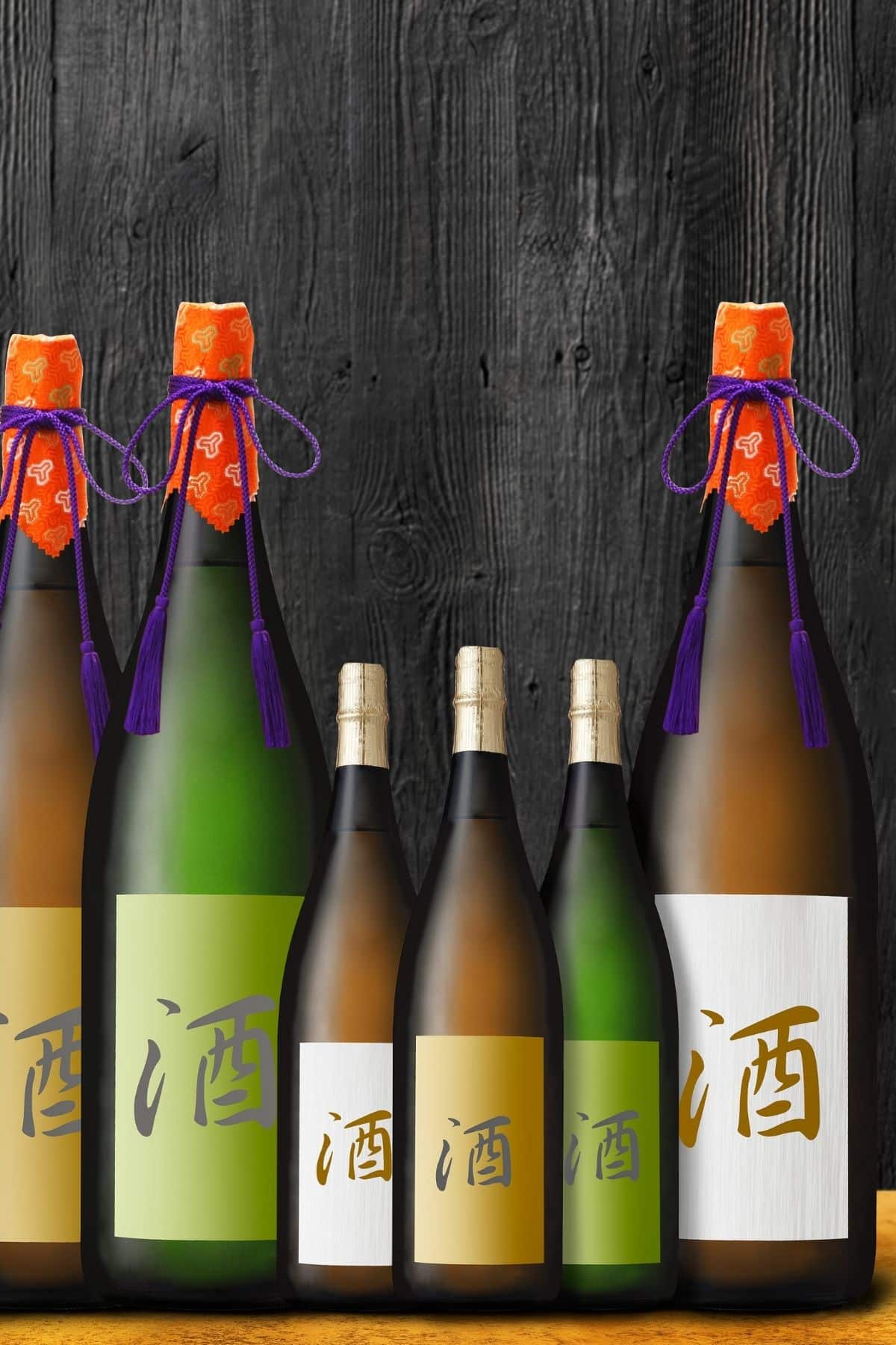 Six bottles of sake on a table.