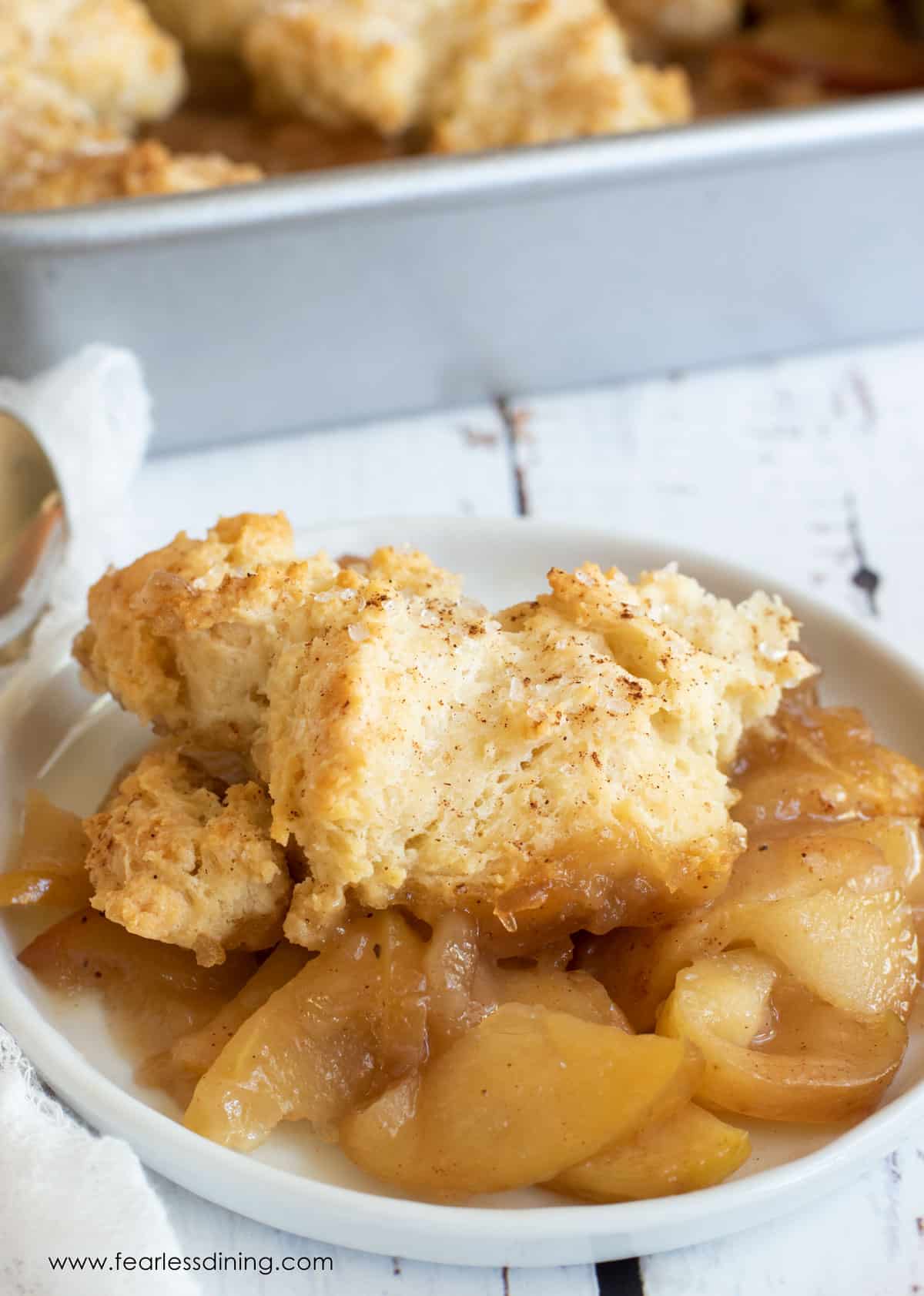 A serving of gluten free apple cobbler in a bowl.