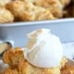 A Pinterest image of a bowl of apple cobbler.