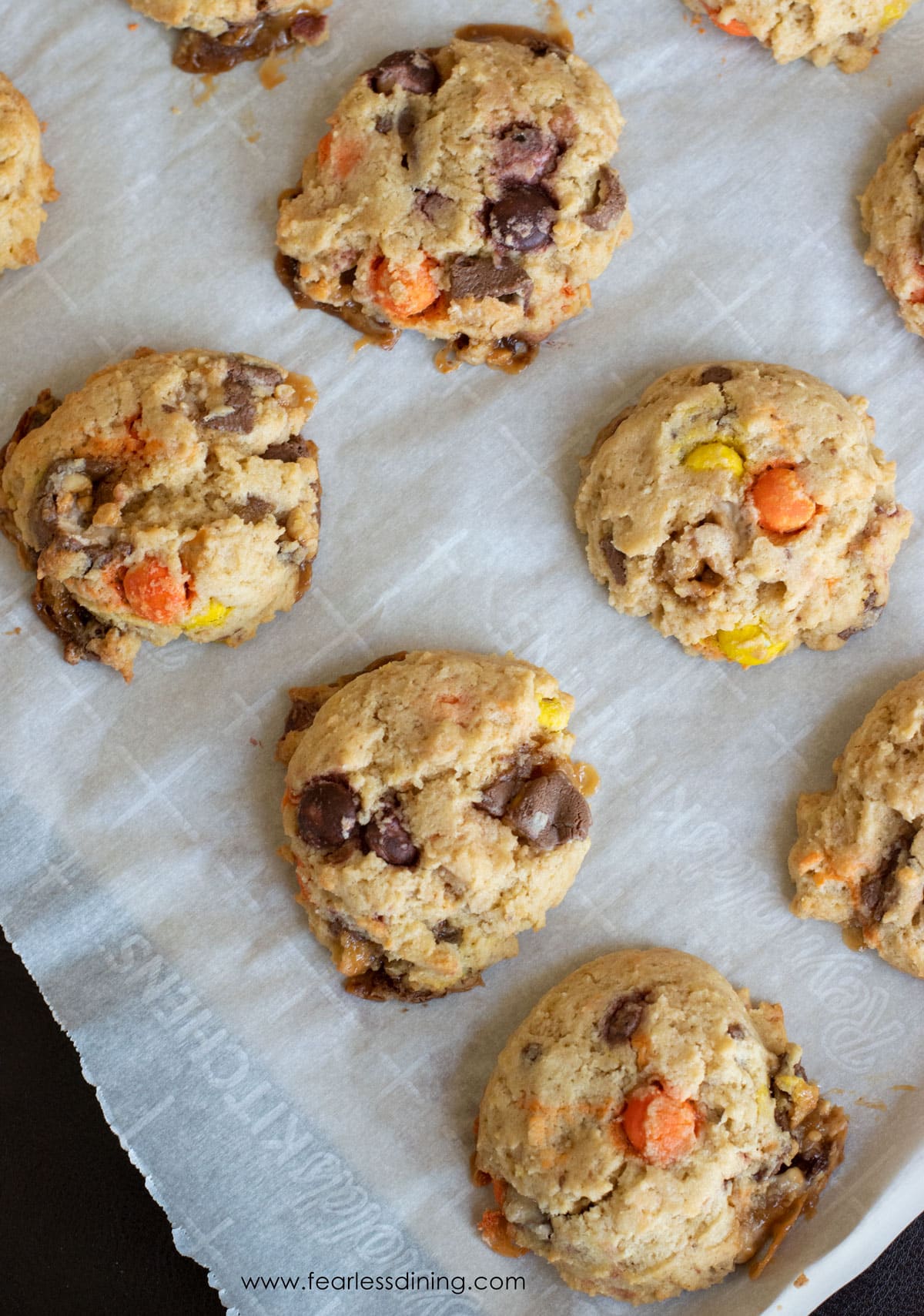 The baked leftover Halloween candy cookies on a cookie sheet.