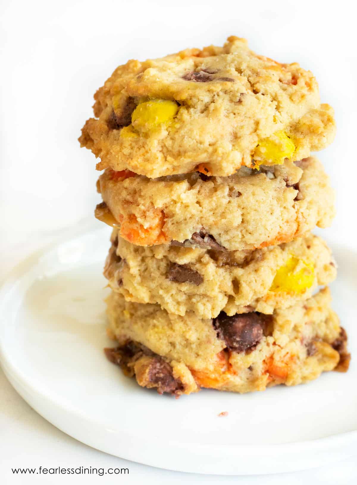 A stack of four leftover Halloween candy cookies.
