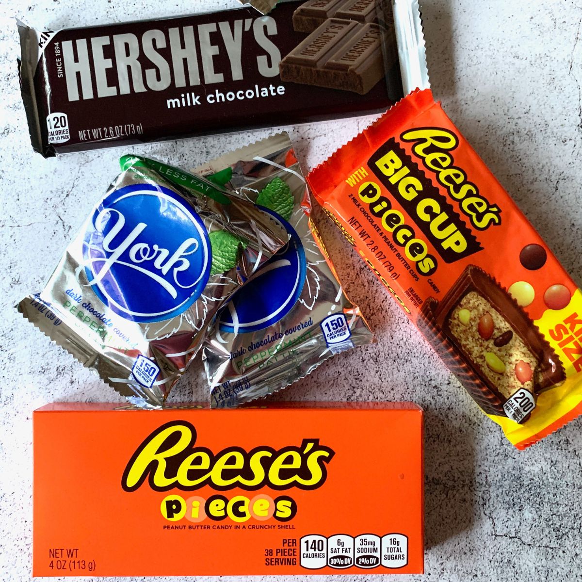 Several types of Hershey candies on a table.