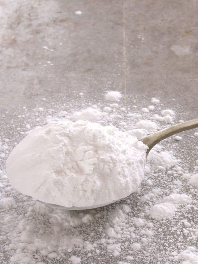 a silver spoon full of powdered sugar.
